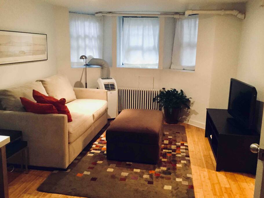 With the new sofa bed and air conditioner hooked up for the summer.