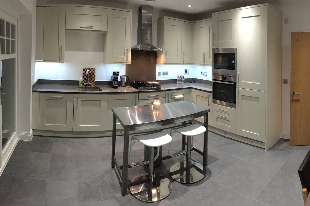 Kitchen space with Nespresso coffee and cooking facilities.