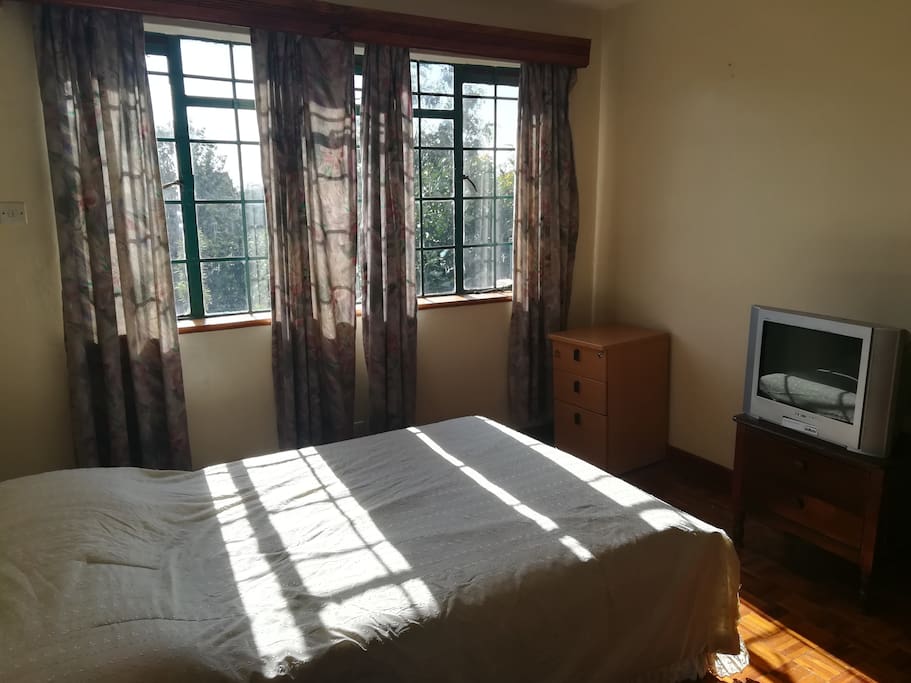 Well lit spacious bedroom