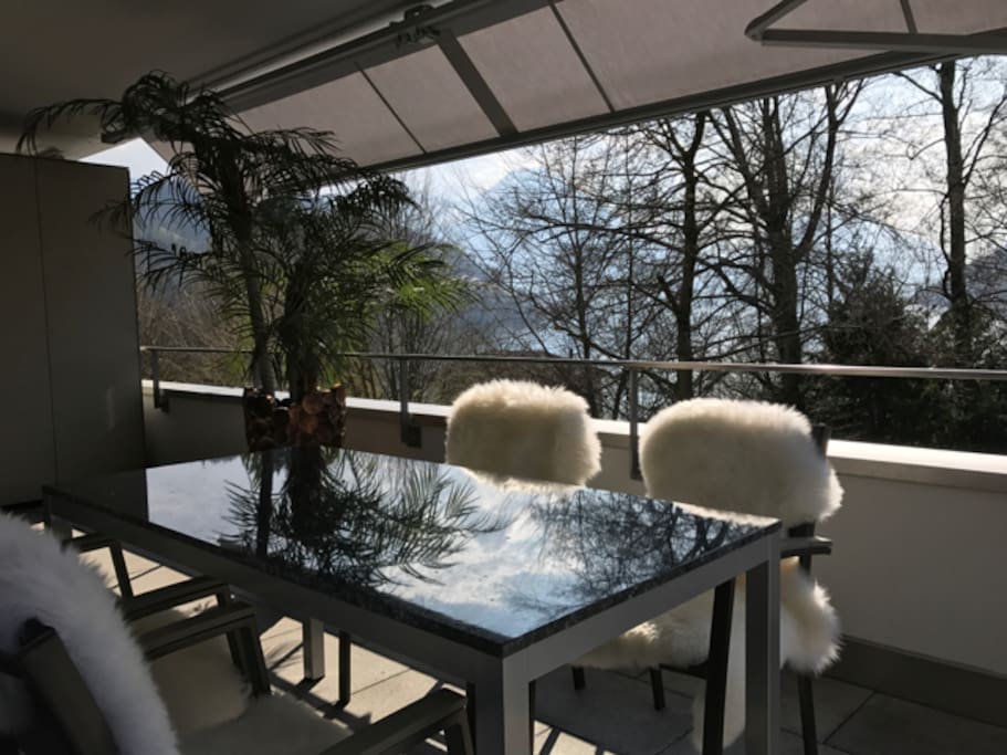Sunny balcony with sun shade (Spring time)