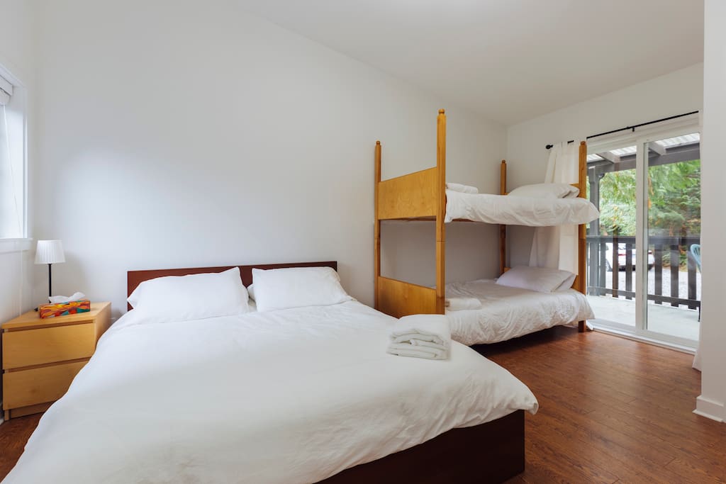First of three bedrooms. Queen size and bunk beds with ensuite bathroom.