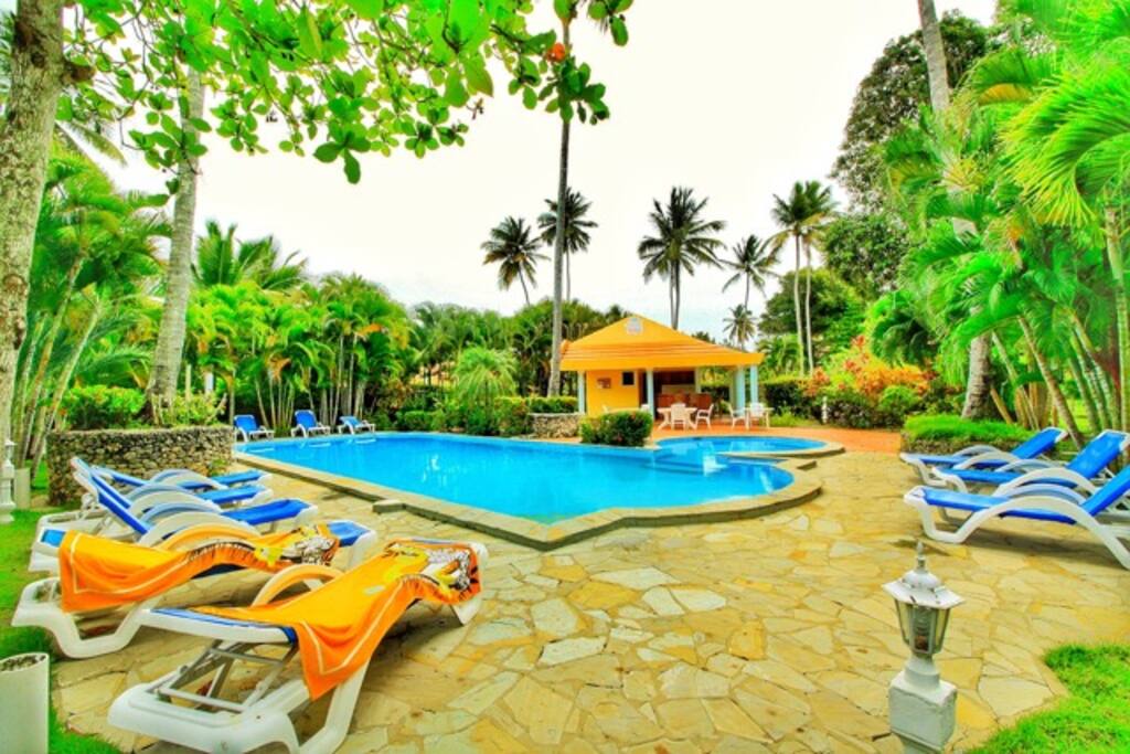 The large filtered pool is the perfect place to relax. It is also near a bar pool lounge.