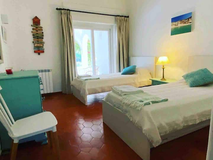 Room 1..... has a sliding bed for a 3rd guest.... can join beds to make double bed for couple