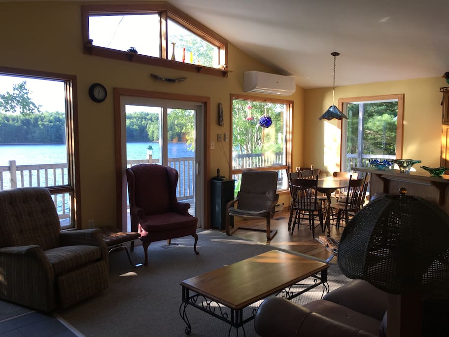 Open concept living room, dining & kitchen.