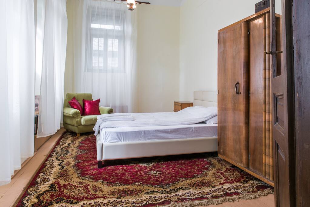 Spacious sleeping room with a comfy bed for a good rest
