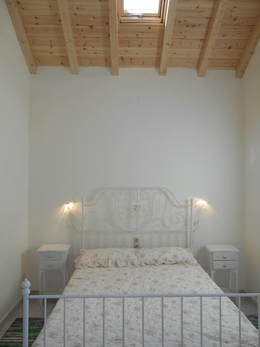 the bedroom with double bed