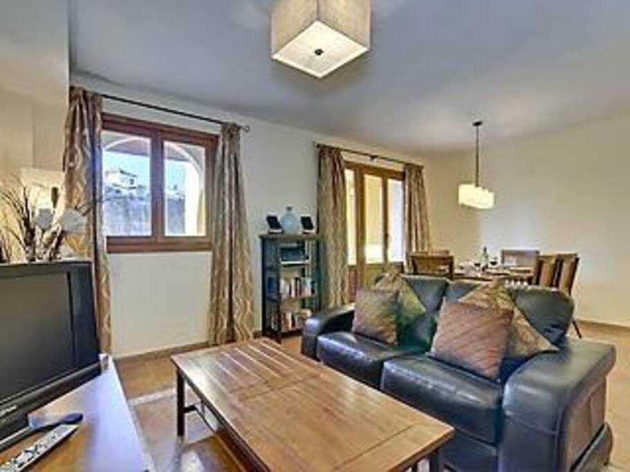 Lounge and dining room leading to patio