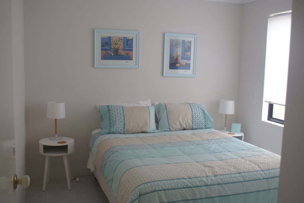 One of 3 queen size bedrooms with built in robes.