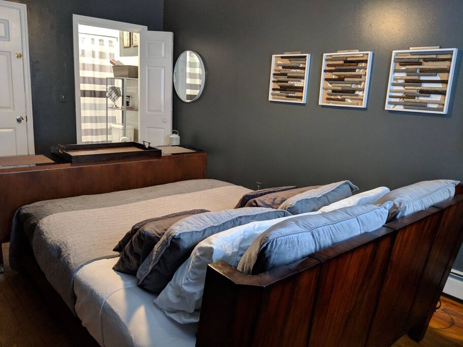 This photo shows the bedroom with the private bathroom.