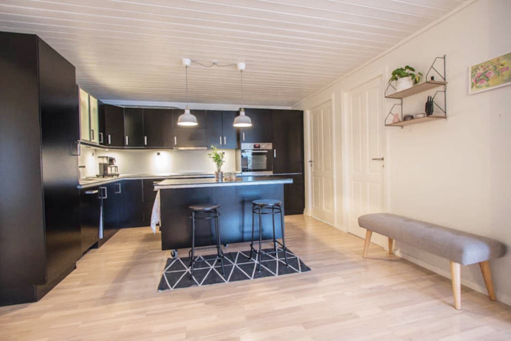 The kitchen is modern and stylish