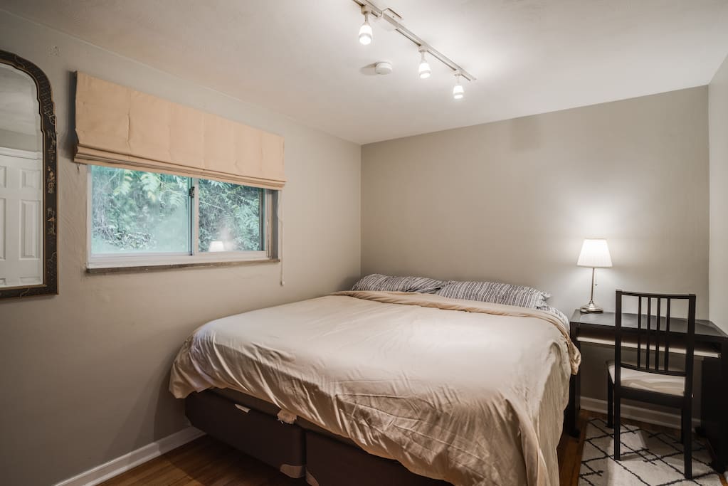 Private guestroom complete with a king size bed, work station, and a 40" Samsung TV!