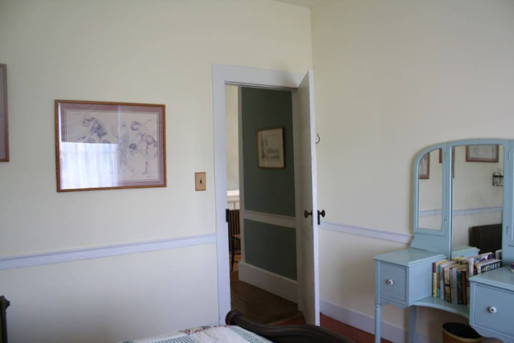 Door to the hallway and upstairs bathroom