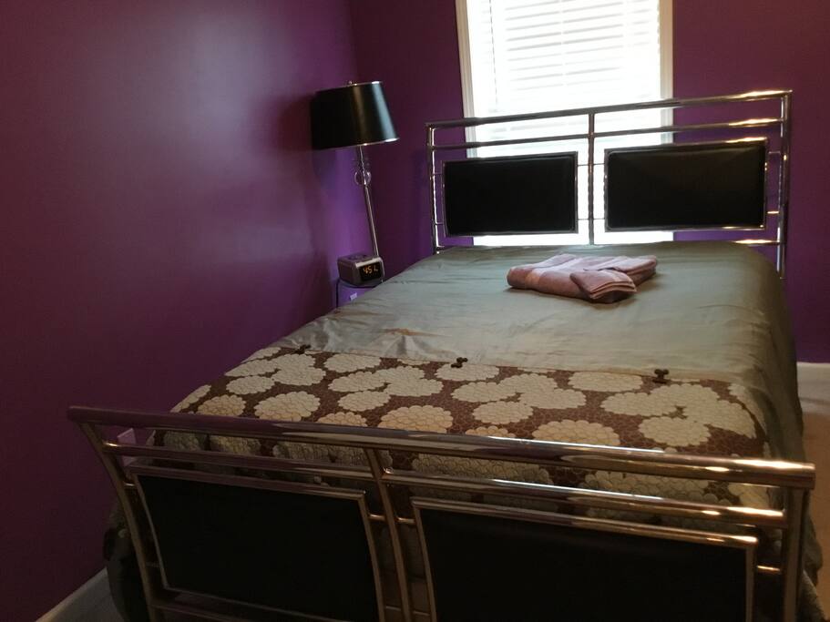Queen size bed that sleeps two.