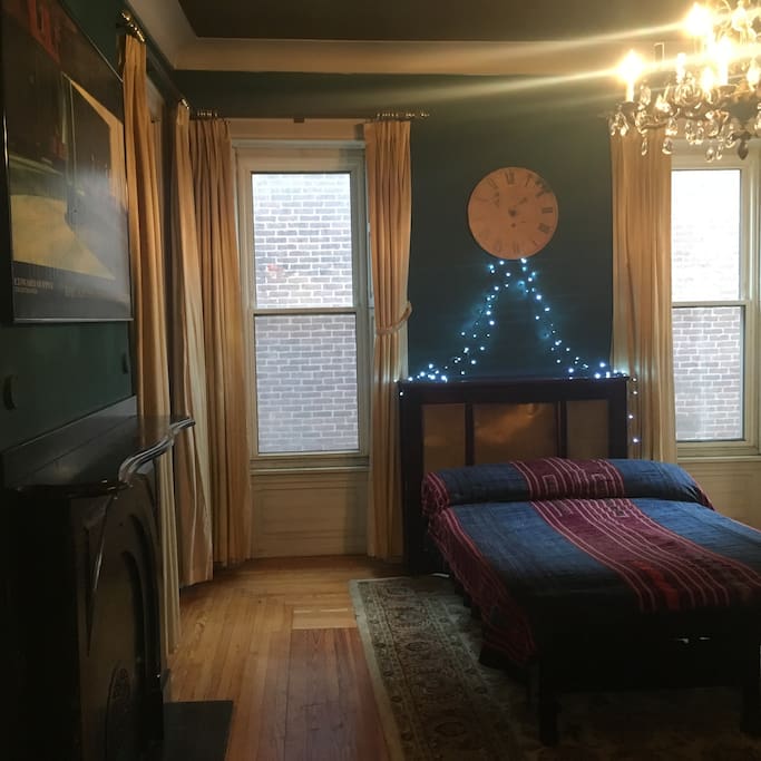 Walk in the door of the room and the bed greets you almost 20 feet away in this giant space