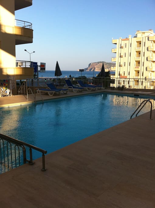 Swimming pool for adults and kids of the complex. Sun beds and umbrellas are incl.