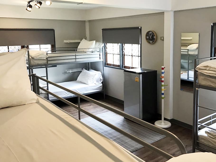 Dormitory room - Clean bedding with hard and soft pillow.