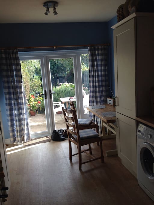 Sunny modern kitchen view to garden