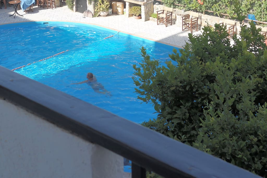Swimming pool that belongs to the Taverna behind the apartment that guests can have access to.