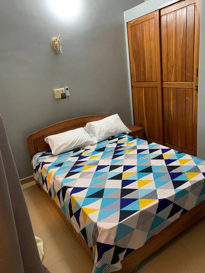 two bedrooms and living room at 198 in Porto Novo