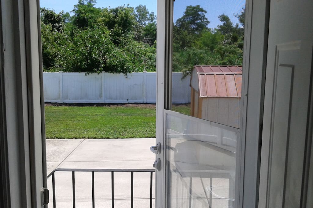 Room 1 opens to backyard also
