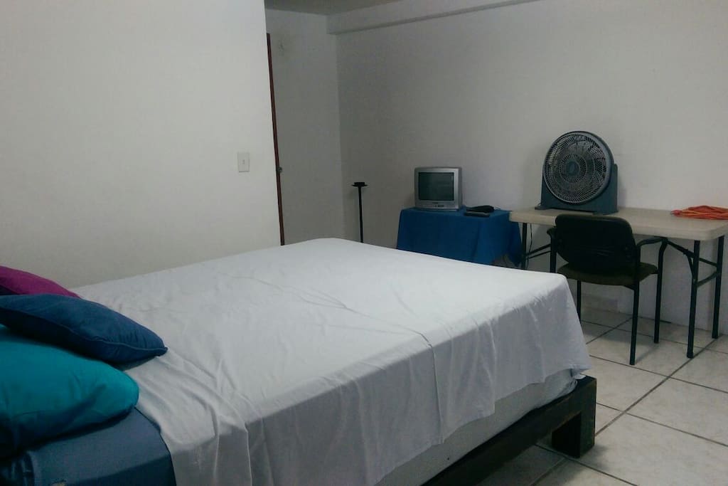 Spacious Bedroom with cable, fan, table and chair etc. If you need anything additional feel free to ask.