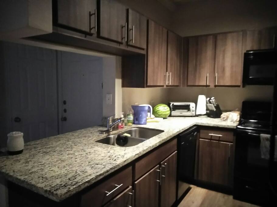 Kitchen avialable for your use with all the utensils, essentials pots and pans. We will even give you room on the fridge for your food!