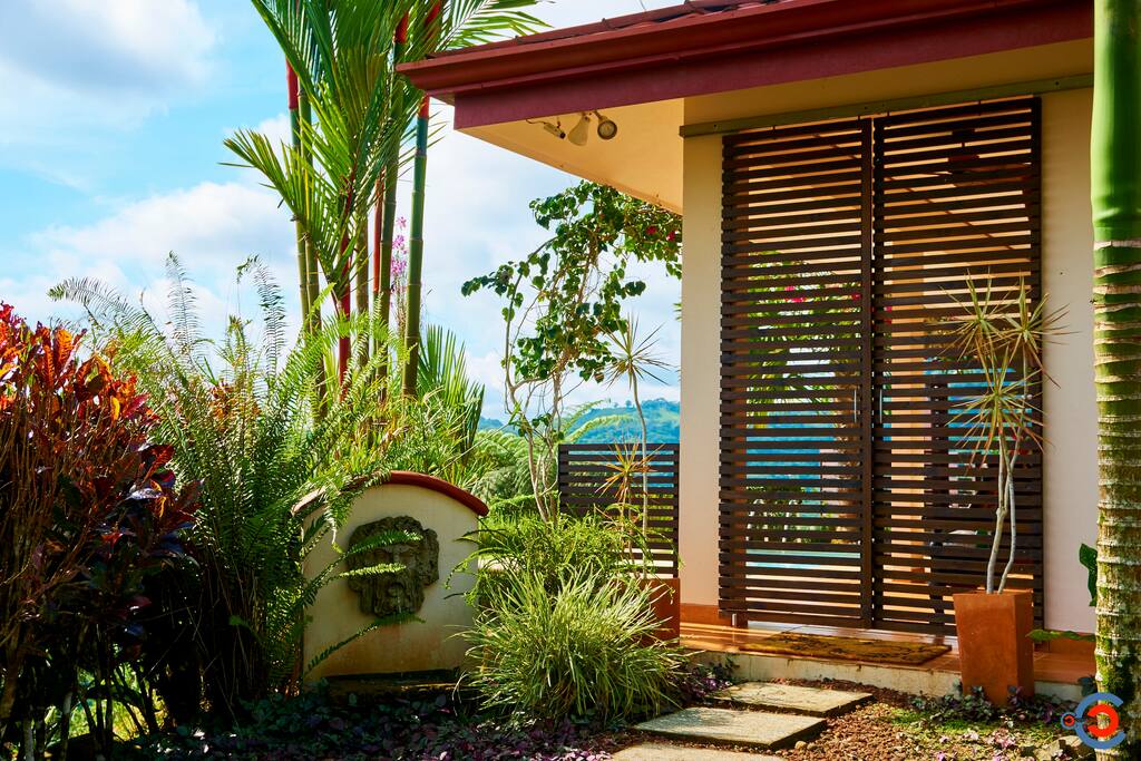 Sliding lattice doors and the fountain of Bacchus welcome you
