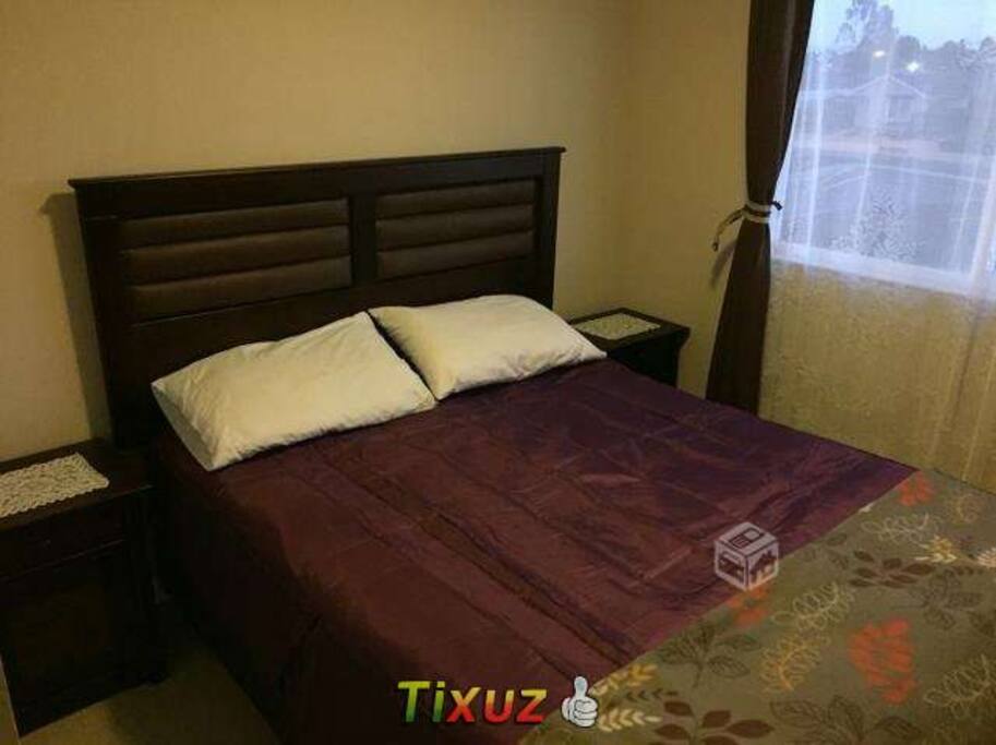 Cama Habitacion principal con baño privado.