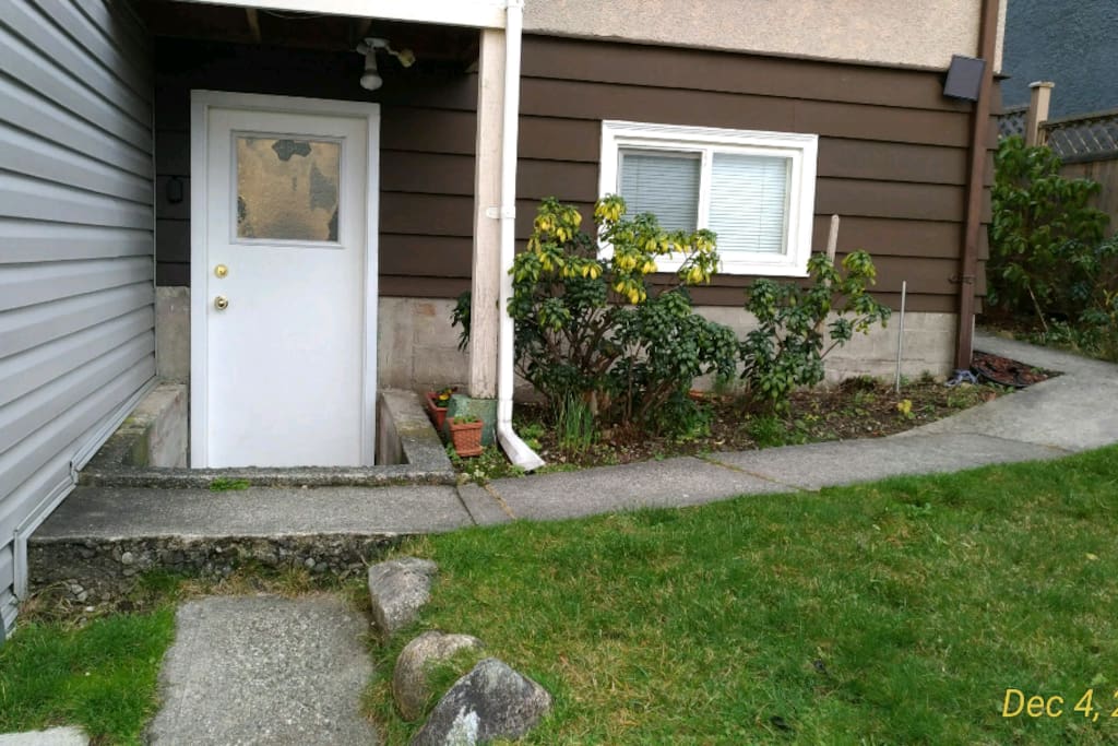 Private entrance door at the back of building