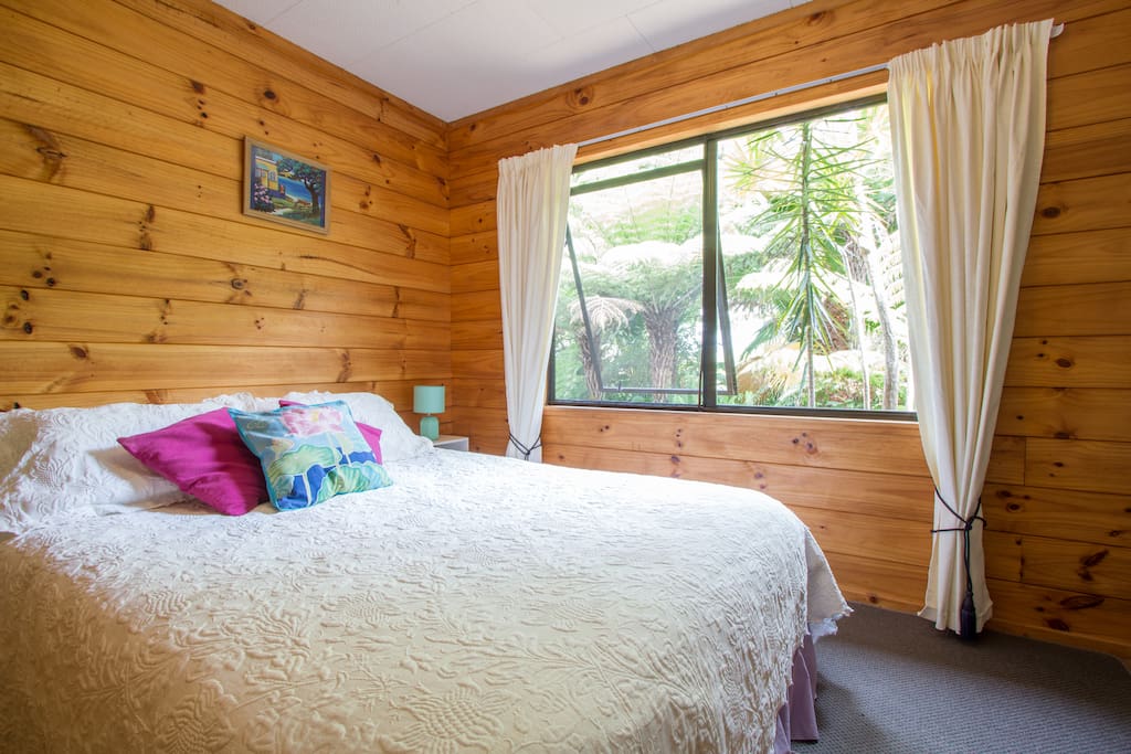 This is a very peaceful light room with lovely bush outlook