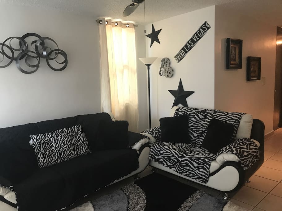 Livingroom, with sofa covers.