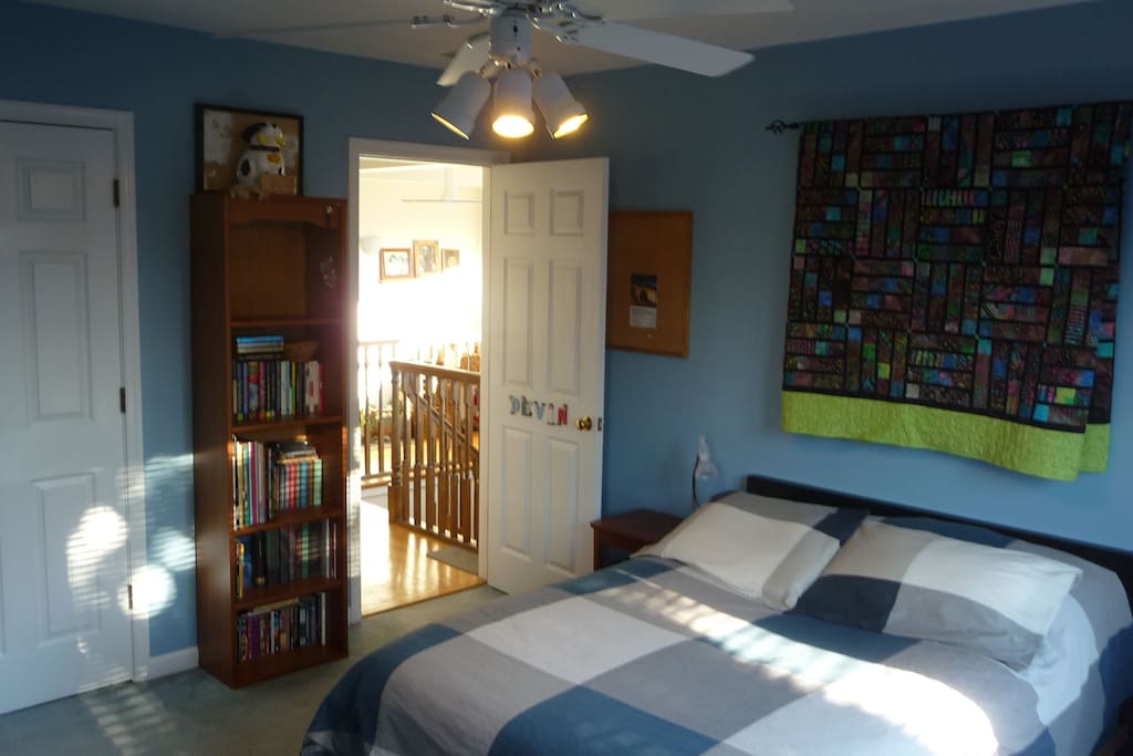 Two bright rooms, this one with a full bed is across the hall from the second room and steps away from a shared full bath.