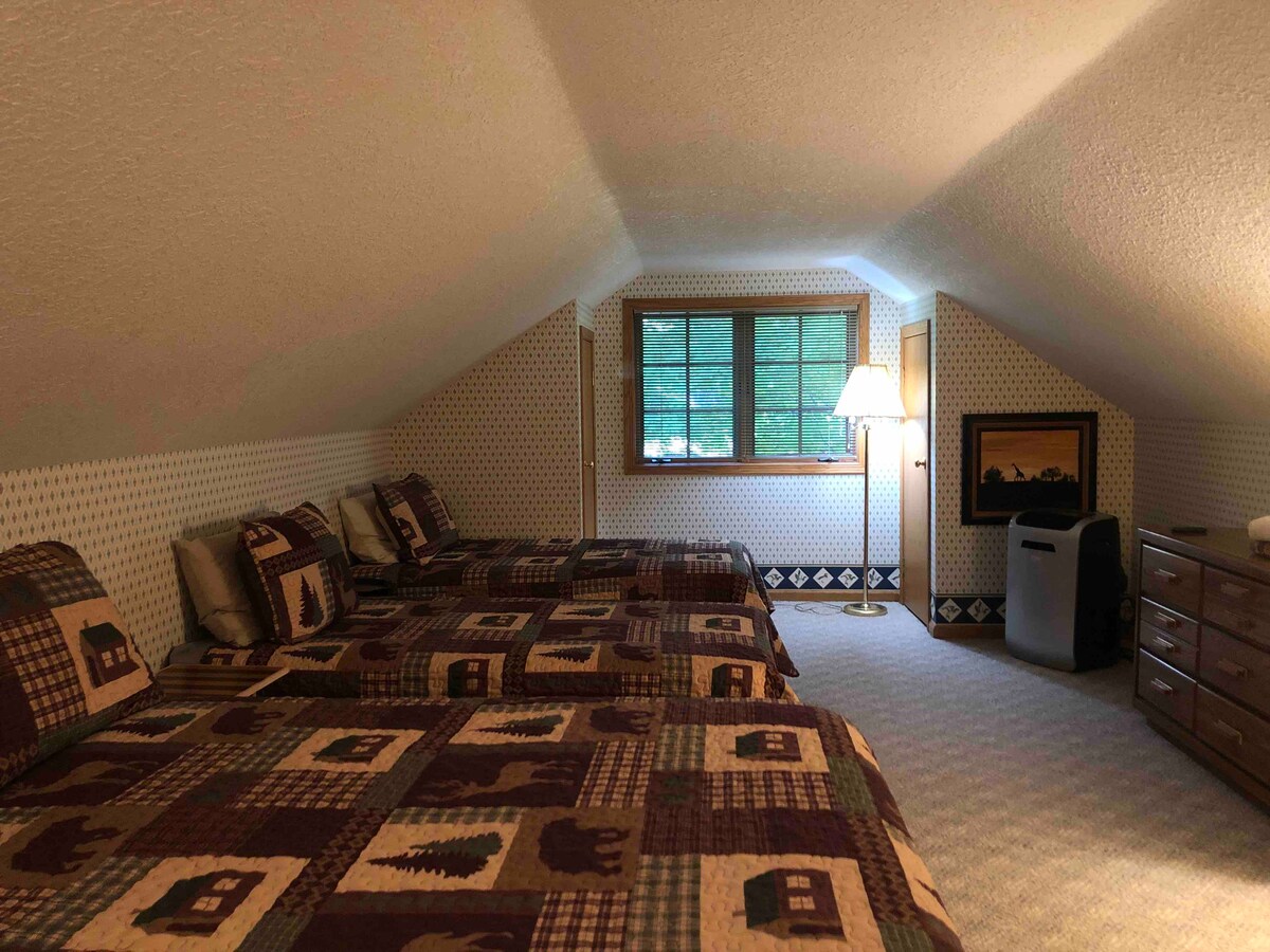 Top of stairs-one Full and two Twin beds