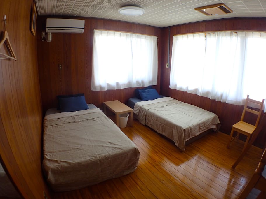 room has two single beds and a bunk bed.extra futon is available if you are group of five.