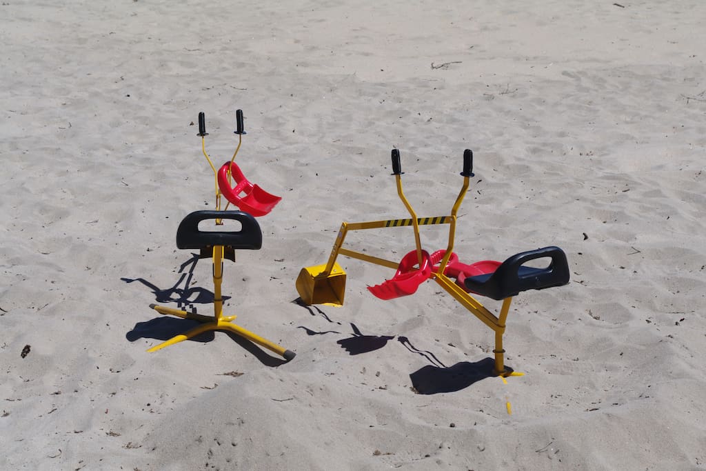 Beach toys, sand diggers, swing set/slide etc.,