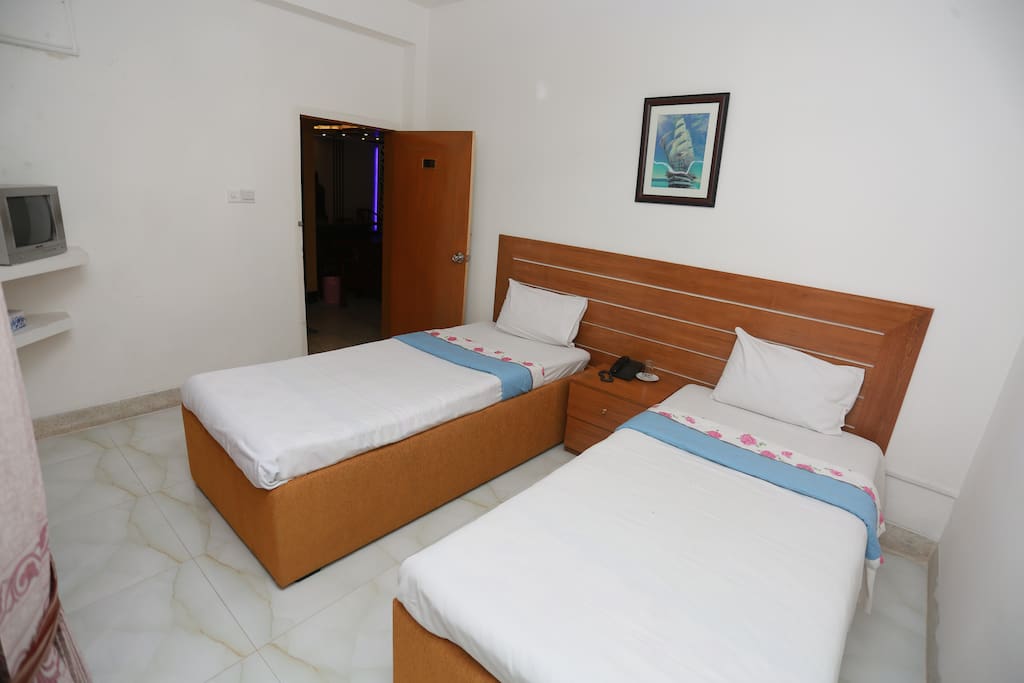Furnished with standard bed, LED TV with satellite cable connection, Telephone in each room, hot and cold running water, attached bath rooms with bath tub, high commode, exhaust fan