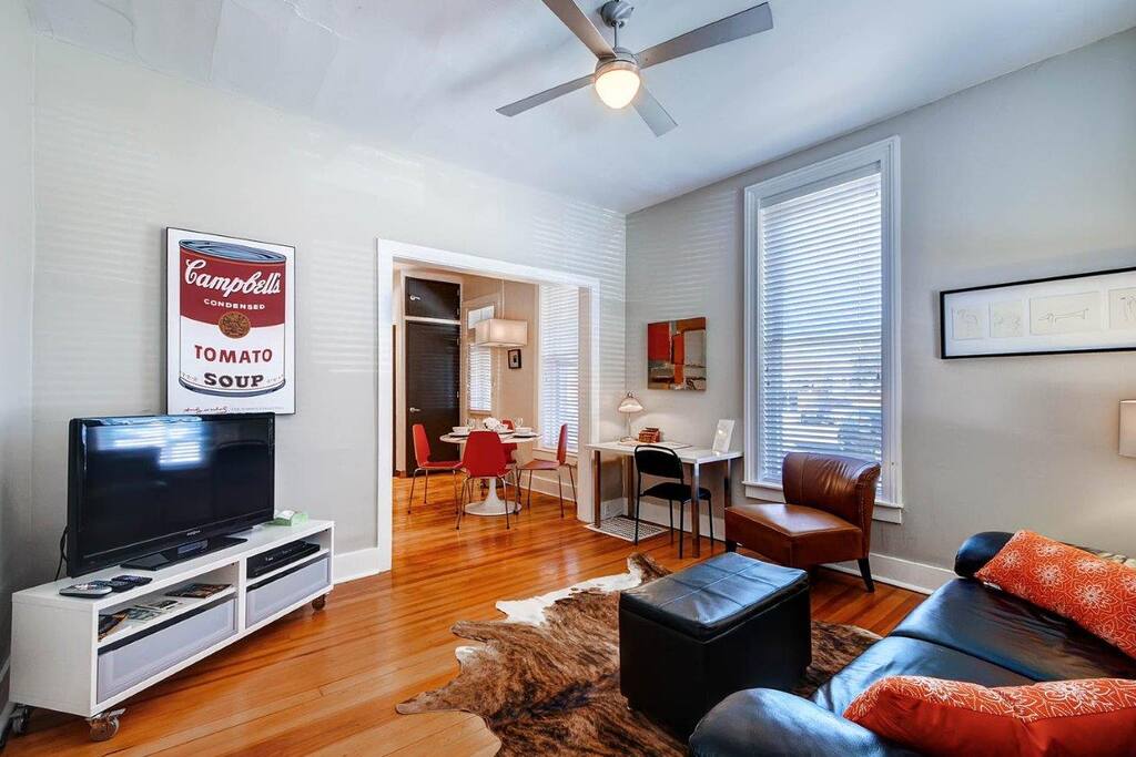 living room opens to dining/kitchen area.