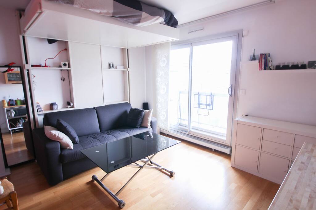 Comfortable couch convertible into sofa bed and nice coffee table