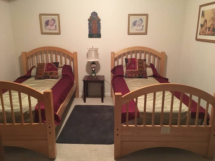 My Grand-daughters' re-purposed twin beds surround by my mom's -Chila's New Life Art - Cupid Collection.  A room full of LOVE! 
