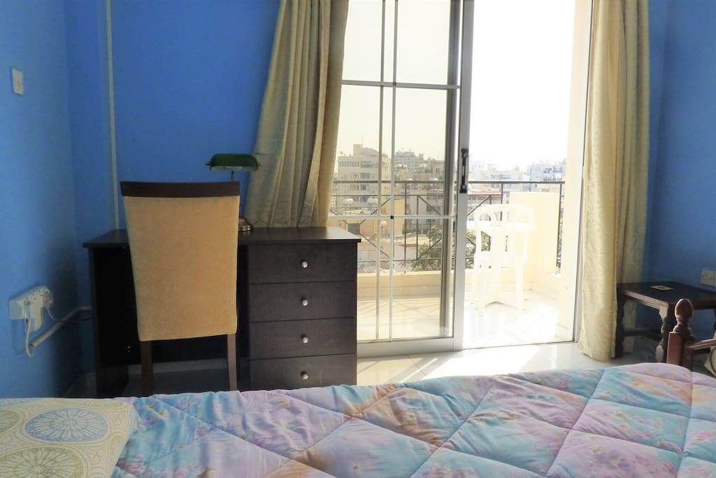 View from the bed towards the balcony