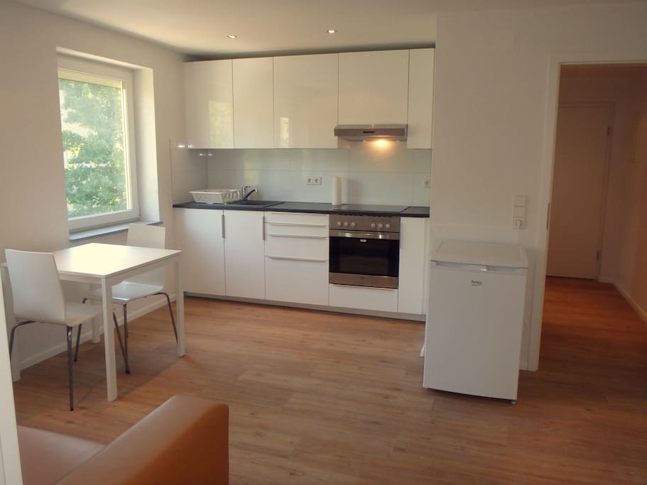 Living room with open plan kitchen