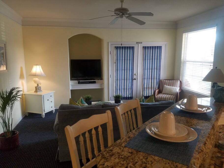 Full view of family room and patio entrance .