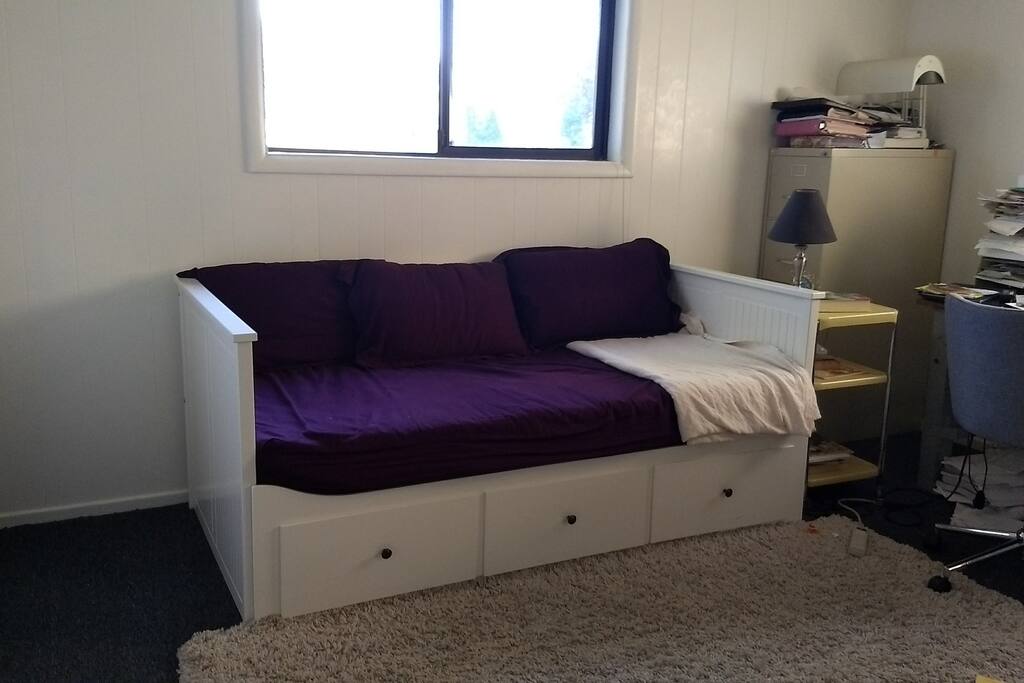 Twin day bed in family room. Can also have a toddler mattress on the floor