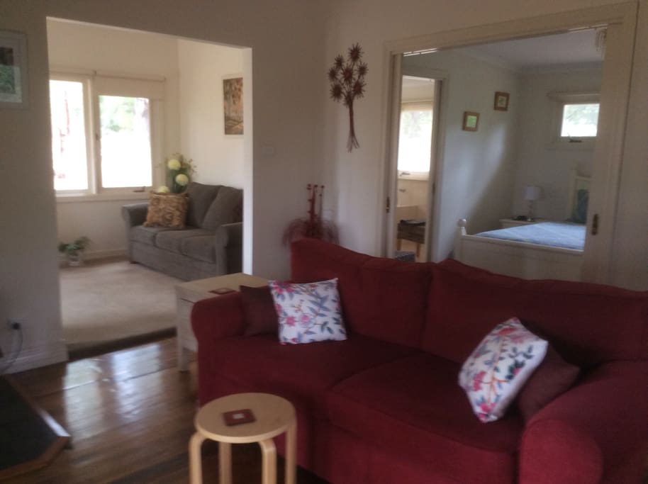 Lounge, bedroom and sunroom with additional pullout sofa bed