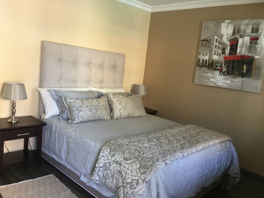 A comfy Queen size bed