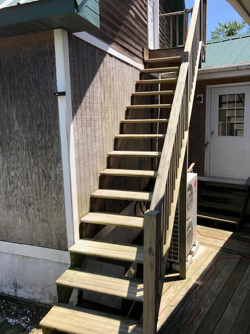 Private entrance up the steps.