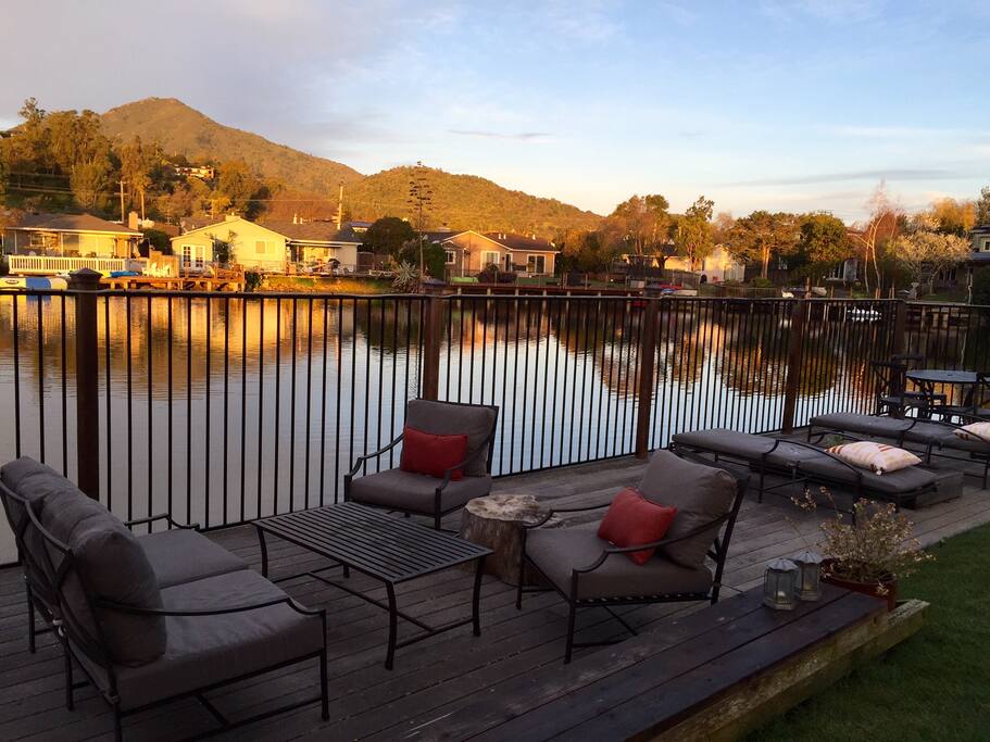 Dock with lounge chairs and small table.