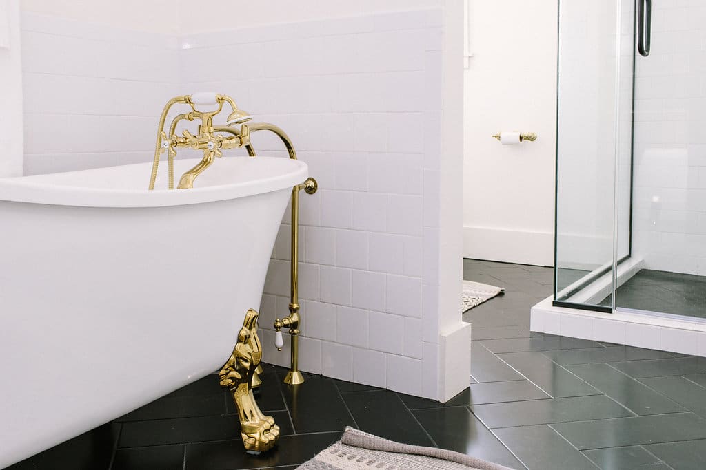 The bathroom in Suite A include a claw foot bathtub and walk in shower.