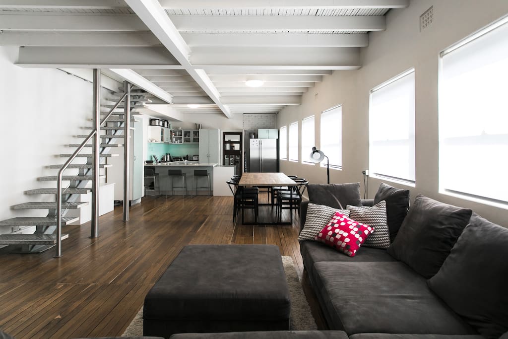 Main communal area on the first floor. Fully equipped kitchen, main newly renovated bathroom, oversized corner lounge, big industrial dining table and TV with Netflix.