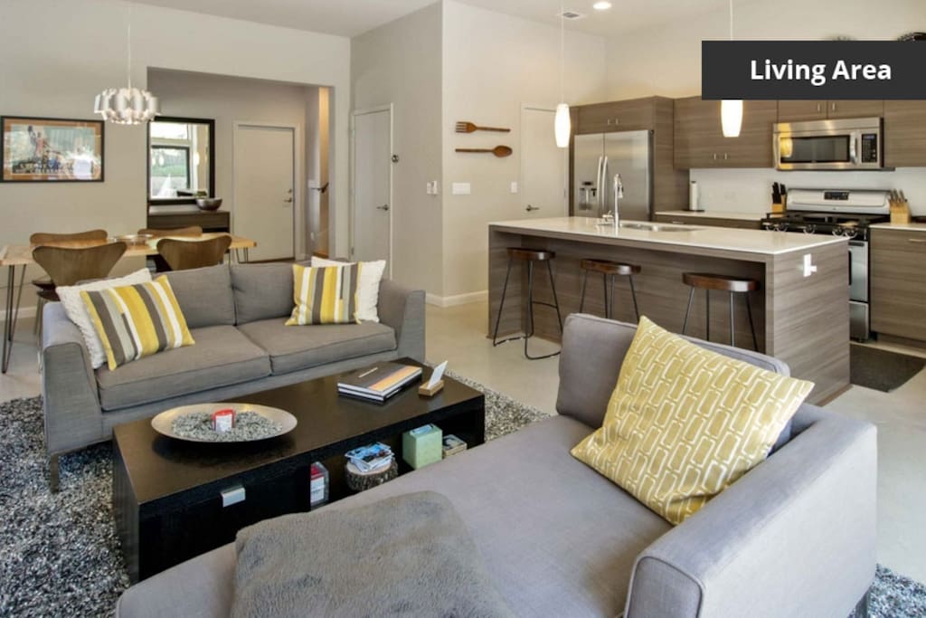 Living room, dining room with open kitchen.